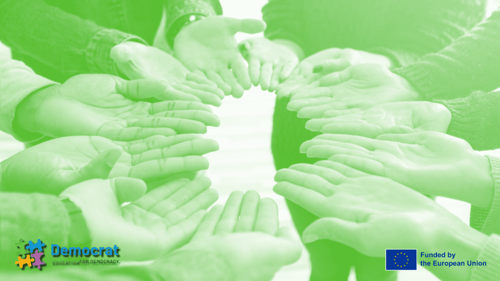 A close-up of hands forming a circle, symbolizing the collaborative efforts of the DEMOCRAT Project’s Local Pilot Projects in promoting education for democracy