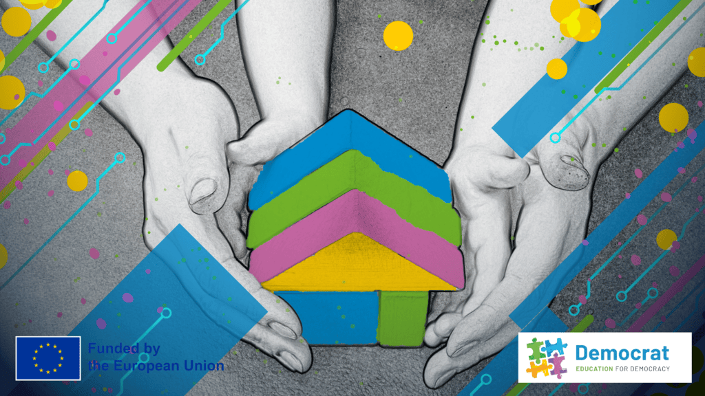 A child and mother’s hand holding a small house made from building blocks, symbolizing the role of family and community in democratic education